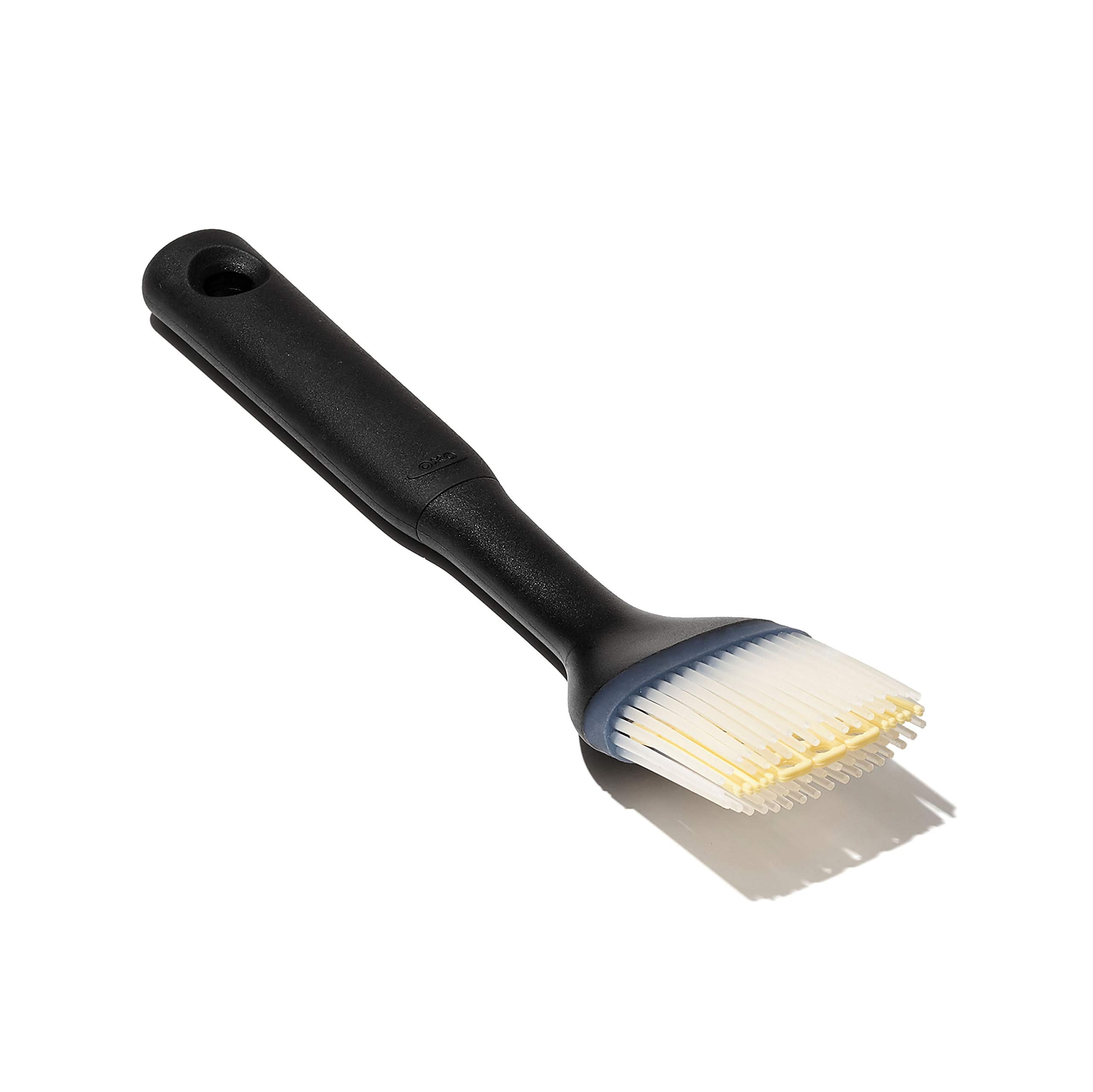 OXO Good Grips silicone basting brush small handle for precise coating.
