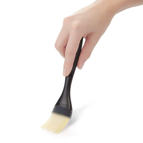 OXO Good Grips brush withstands heat up to 600°F for hot pan tasks.