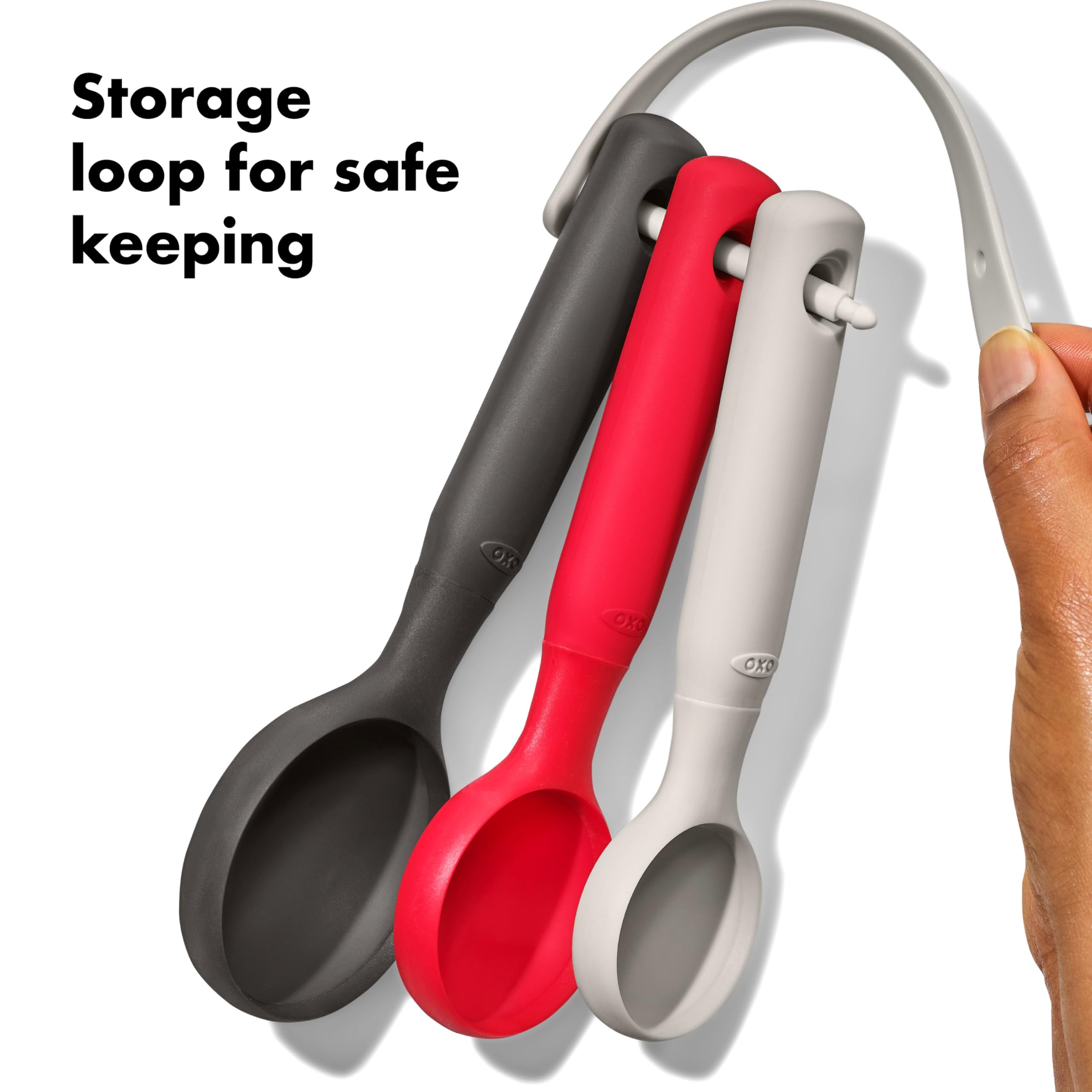 OXO Good Grips cookie scoop storage loop keeps scoops organized.