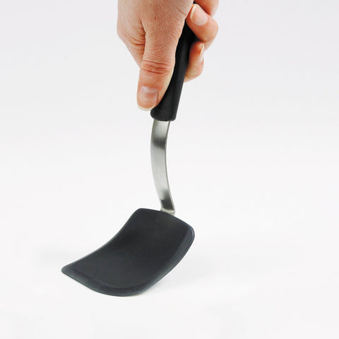 OXO Good Grips silicone cookie spatula with a flexible edge glides under cookies.