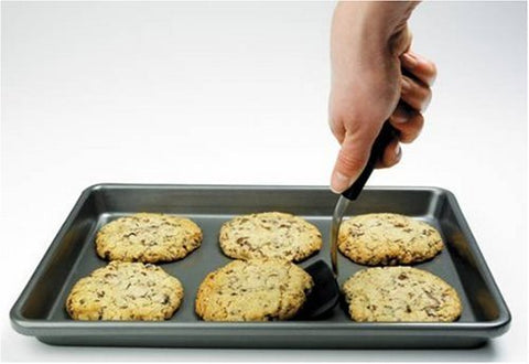 OXO Good Grips Silicone Cookie Spatula – side handle view showing ergonomic angled grip.