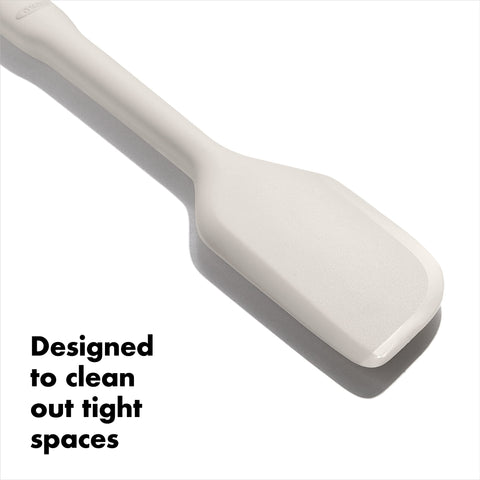 OXO Good Grips spatula bowl scraping to get every last drop.