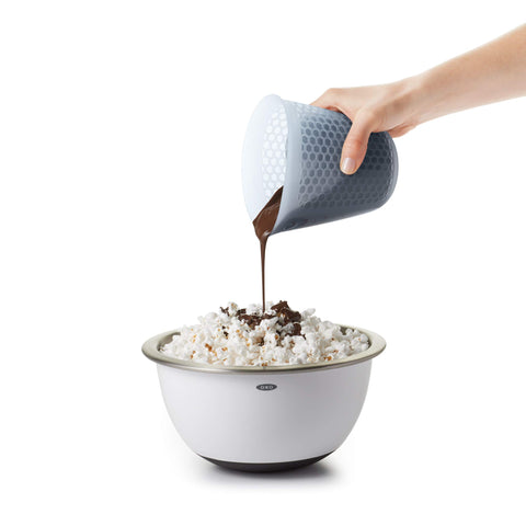 OXO Good Grips mini silicone measuring cup in a compact kitchen