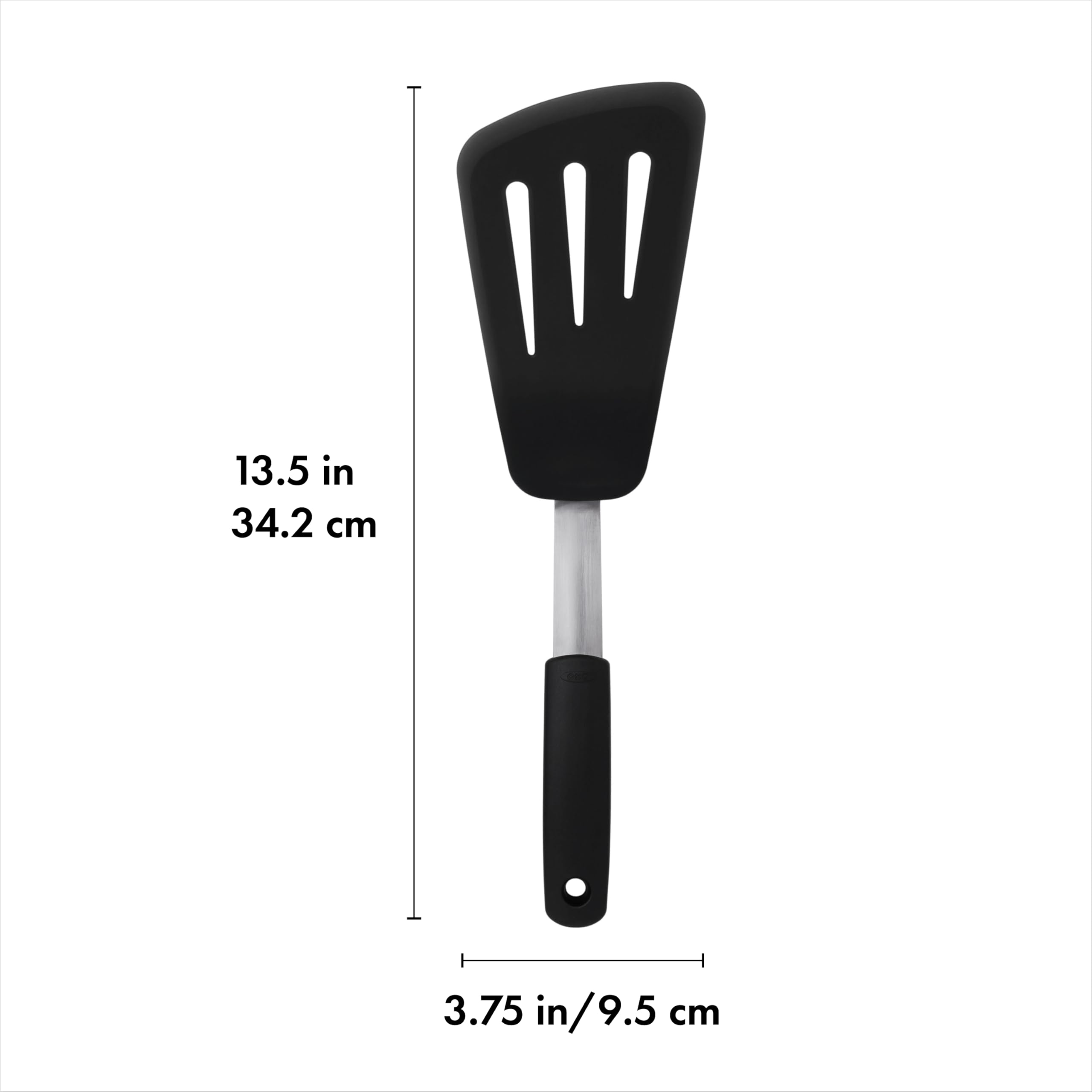 OXO Good Grips omelet turner glides beneath food in pan for intact flipping.