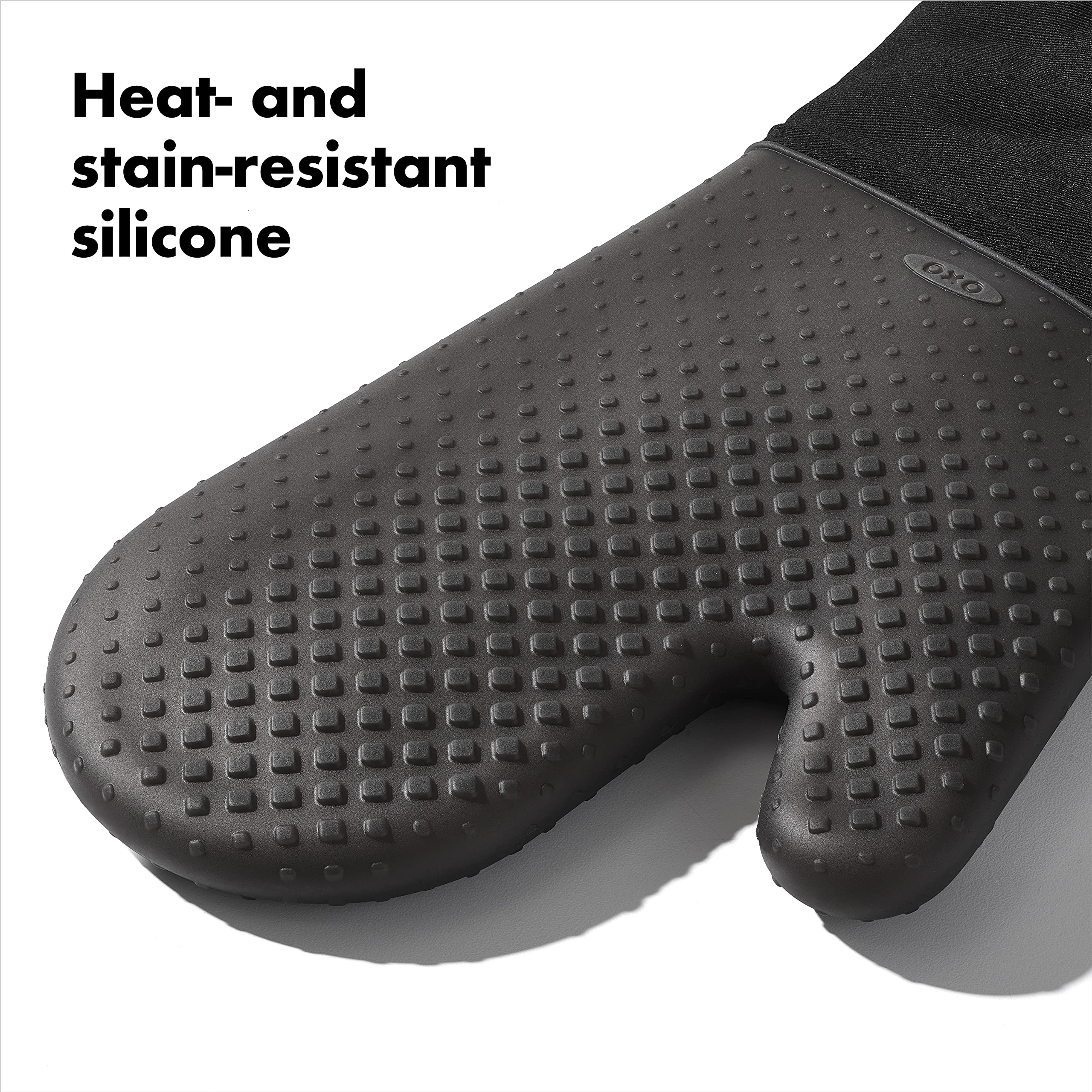 OXO Good Grips silicone oven mitt black, easy cleaning after cooking.