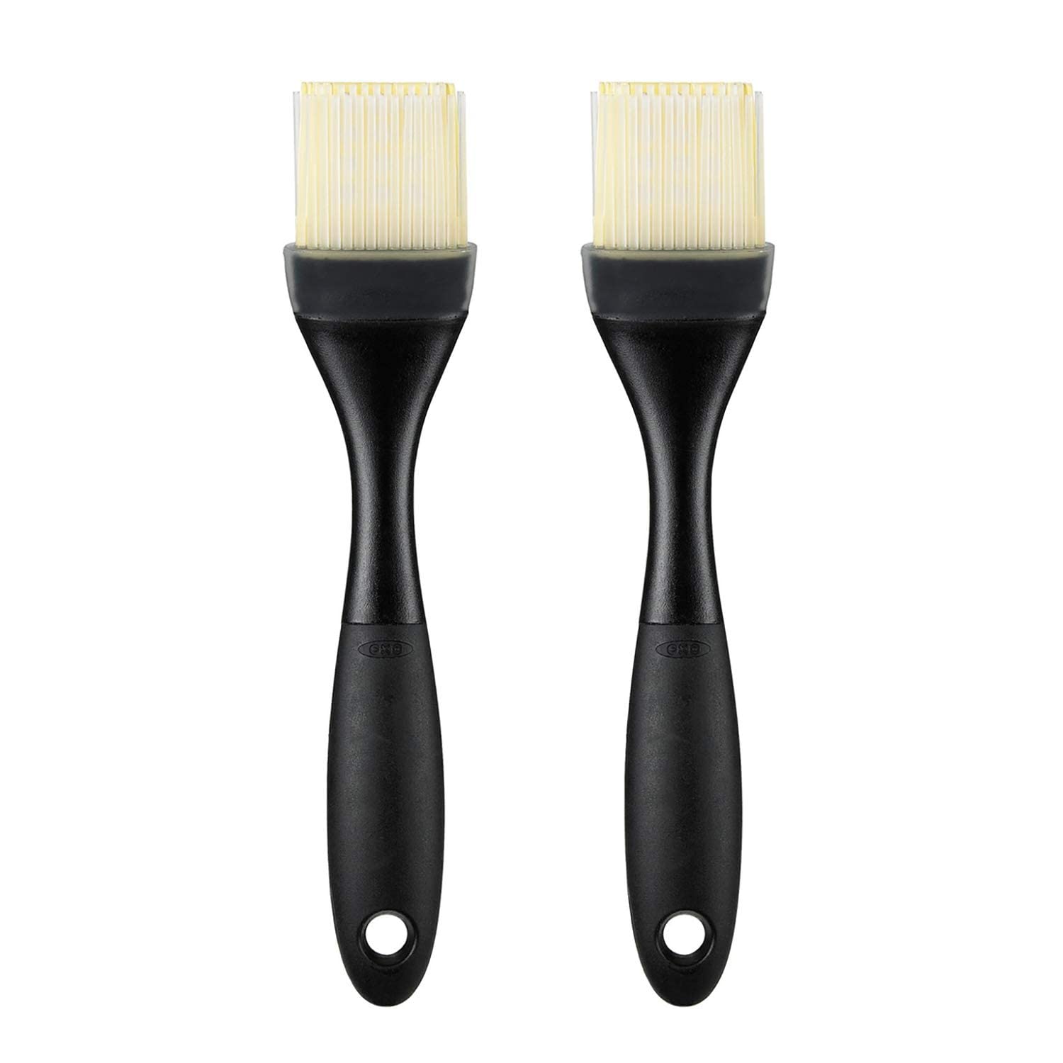 OXO Good Grips silicone pastry brush with angled head for tidy countertop use.