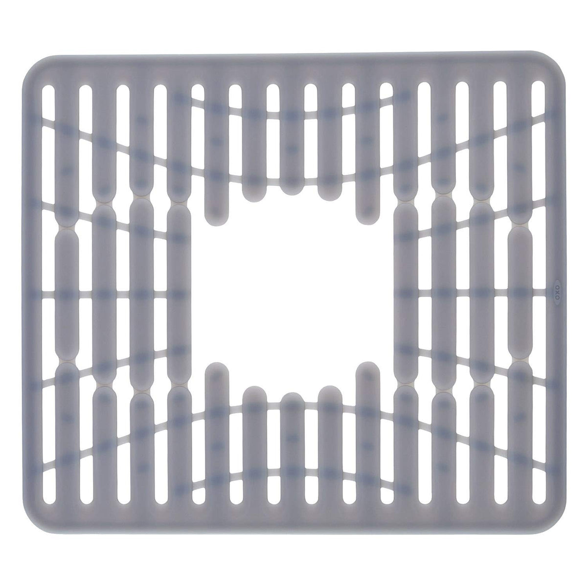 OXO Good Grips silicone sink mat in sink protecting glasses and dishes from scratches.