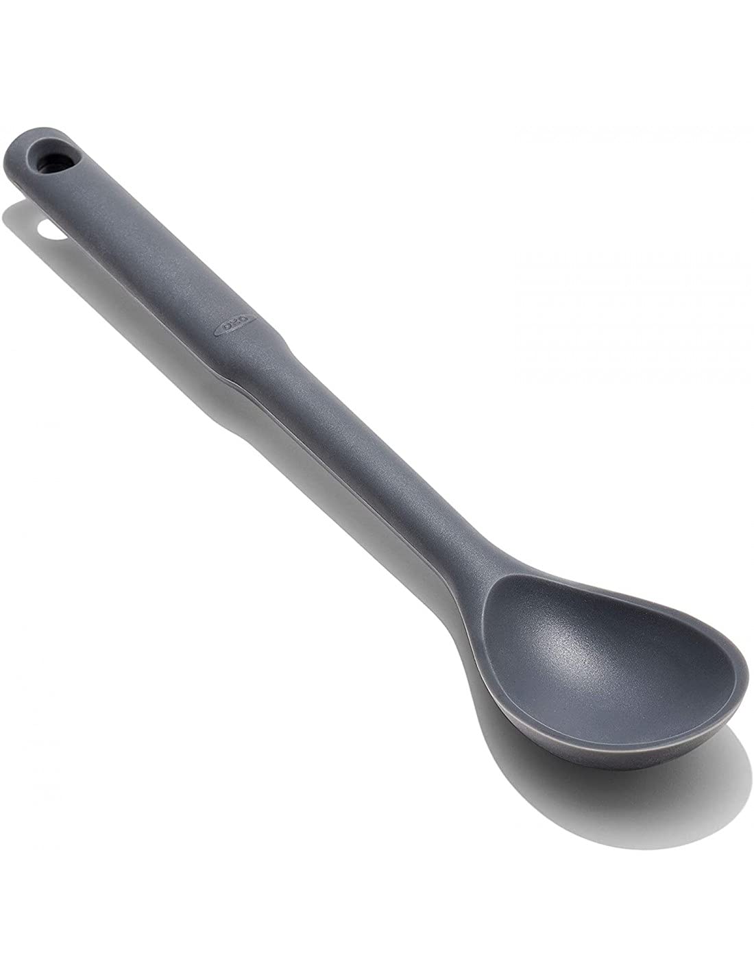 OXO Good Grips Silicone Spoon stirs sauce and scrapes pans without scratching non-stick surfaces.