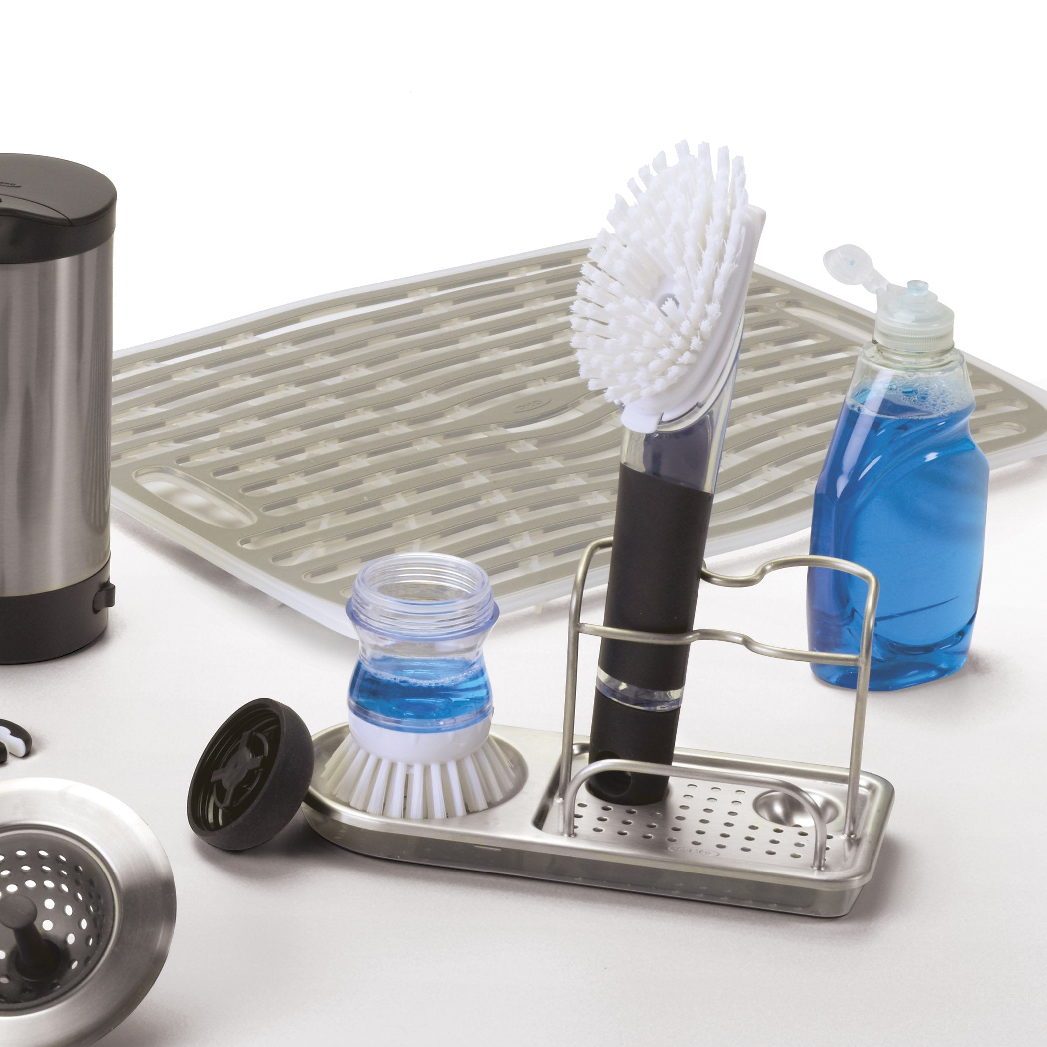 OXO Good Grips sink caddy gray, compartments close-up for palm brushes and pumps