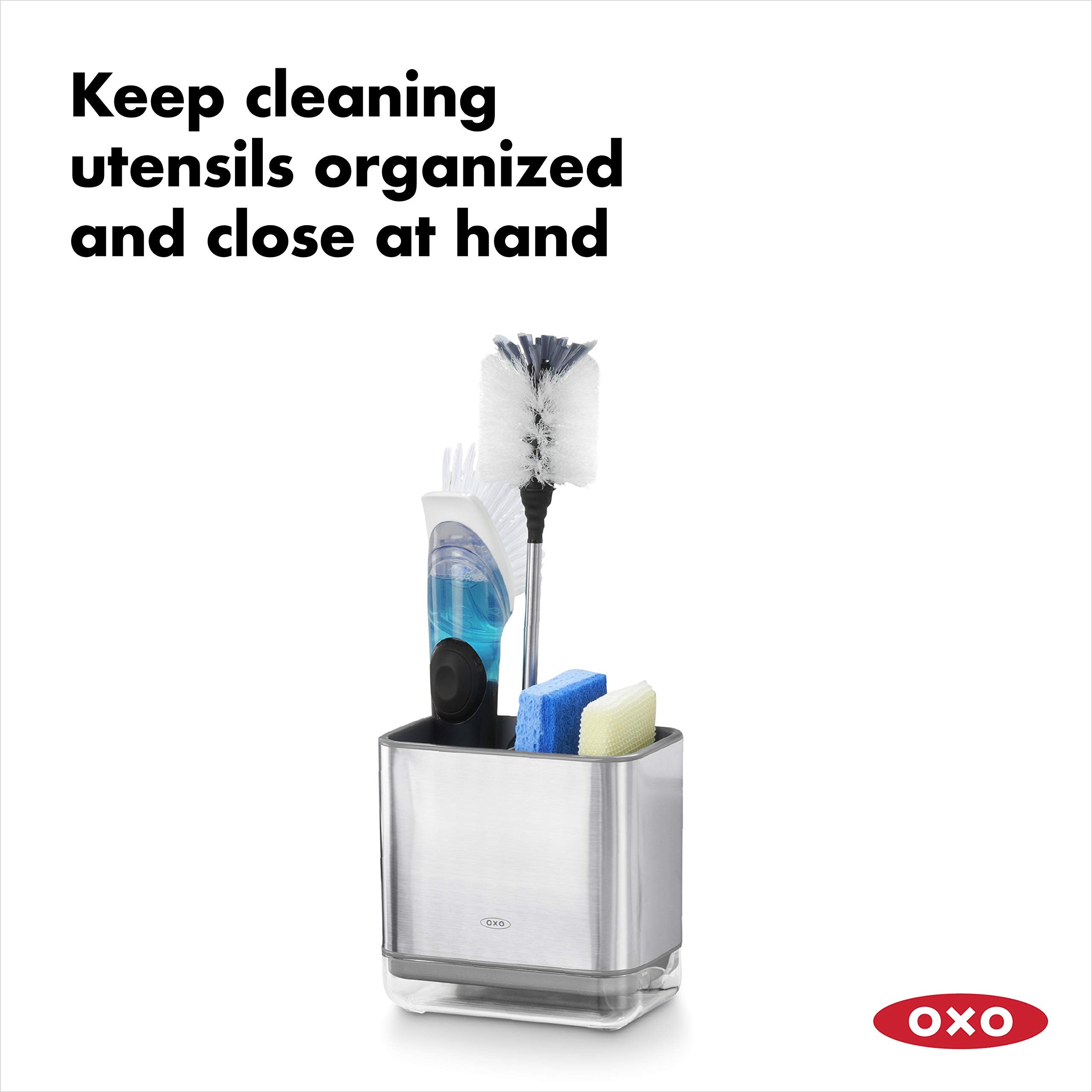 OXO Good Grips sinkware caddy divider inside separates sponges and brushes for faster drying.