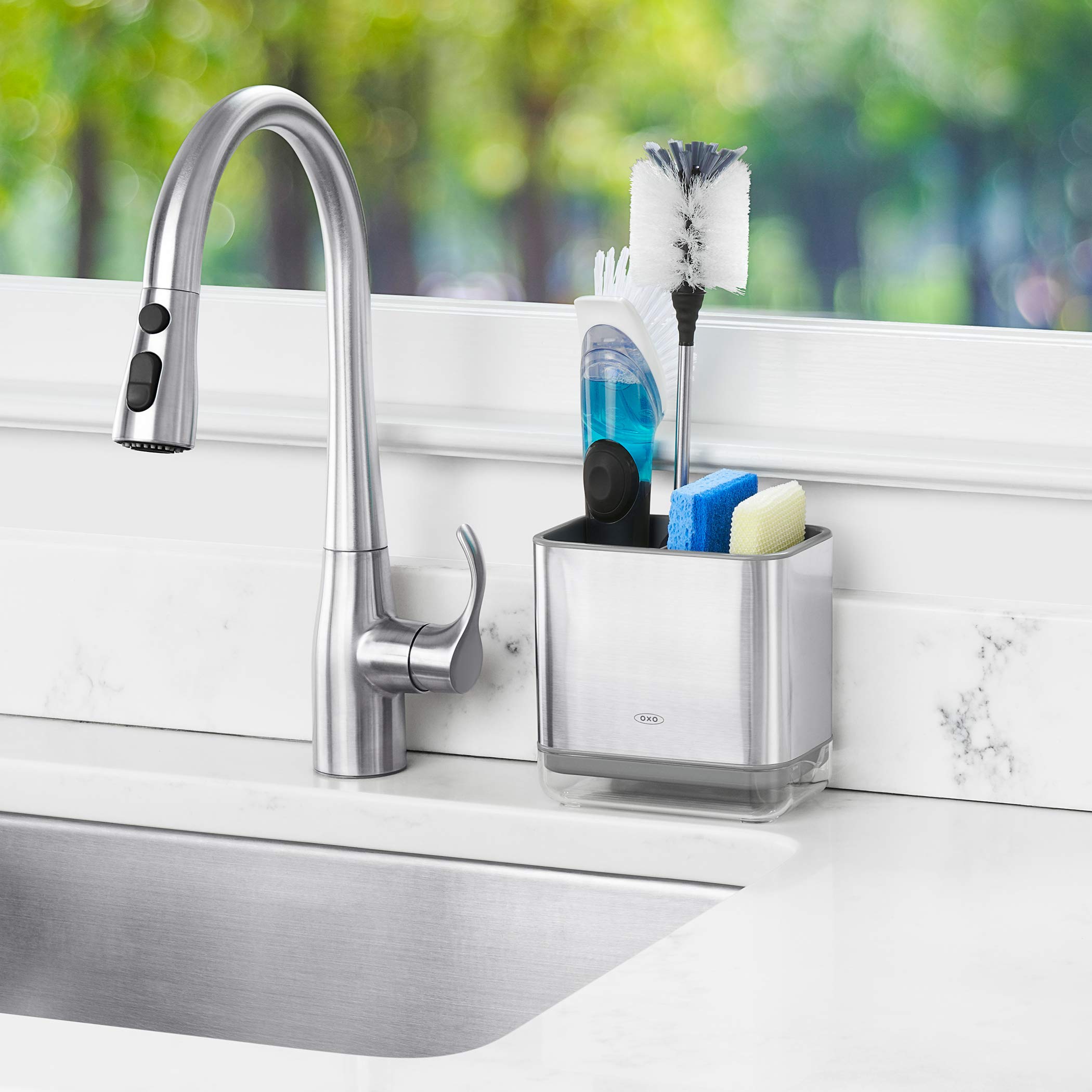OXO Good Grips sinkware caddy stainless steel finish complements modern kitchens.