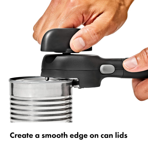OXO Good Grips Smooth Edge Can Opener shows lid pliers for contact-free removal.