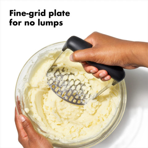 OXO Good Grips Smooth Potato Masher side view showing fine-grid mashing plate