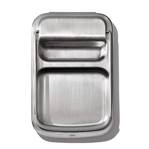 Lid holder accommodates large and small lids securely during prep.