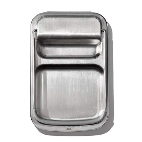 Lid holder accommodates large and small lids securely during prep.