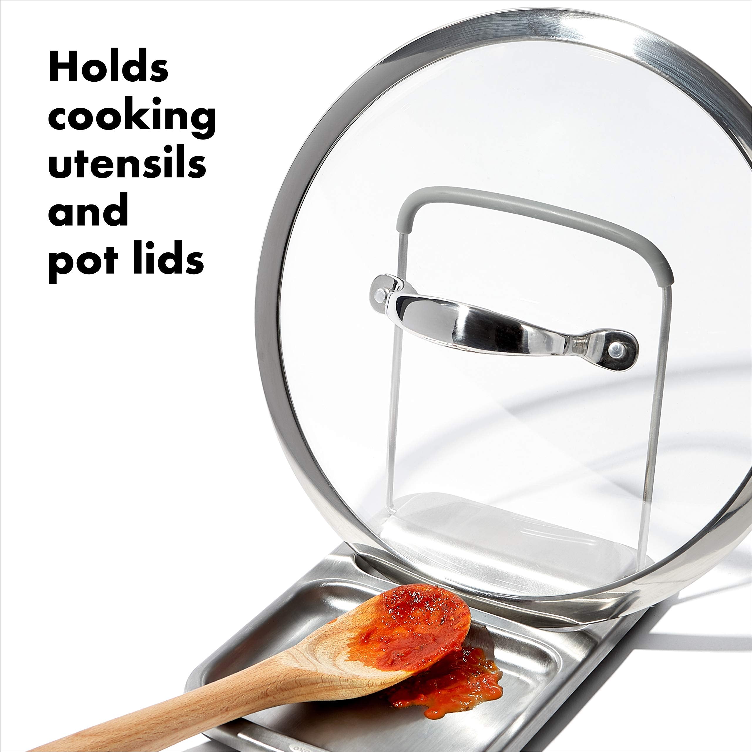 OXO Good Grips base and wire lid slot keep lids stable while cooking.