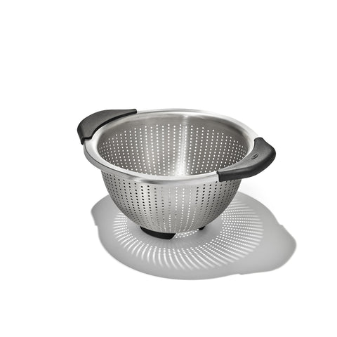 OXO Good Grips 3-qt colander with elevated handles for secure draining.