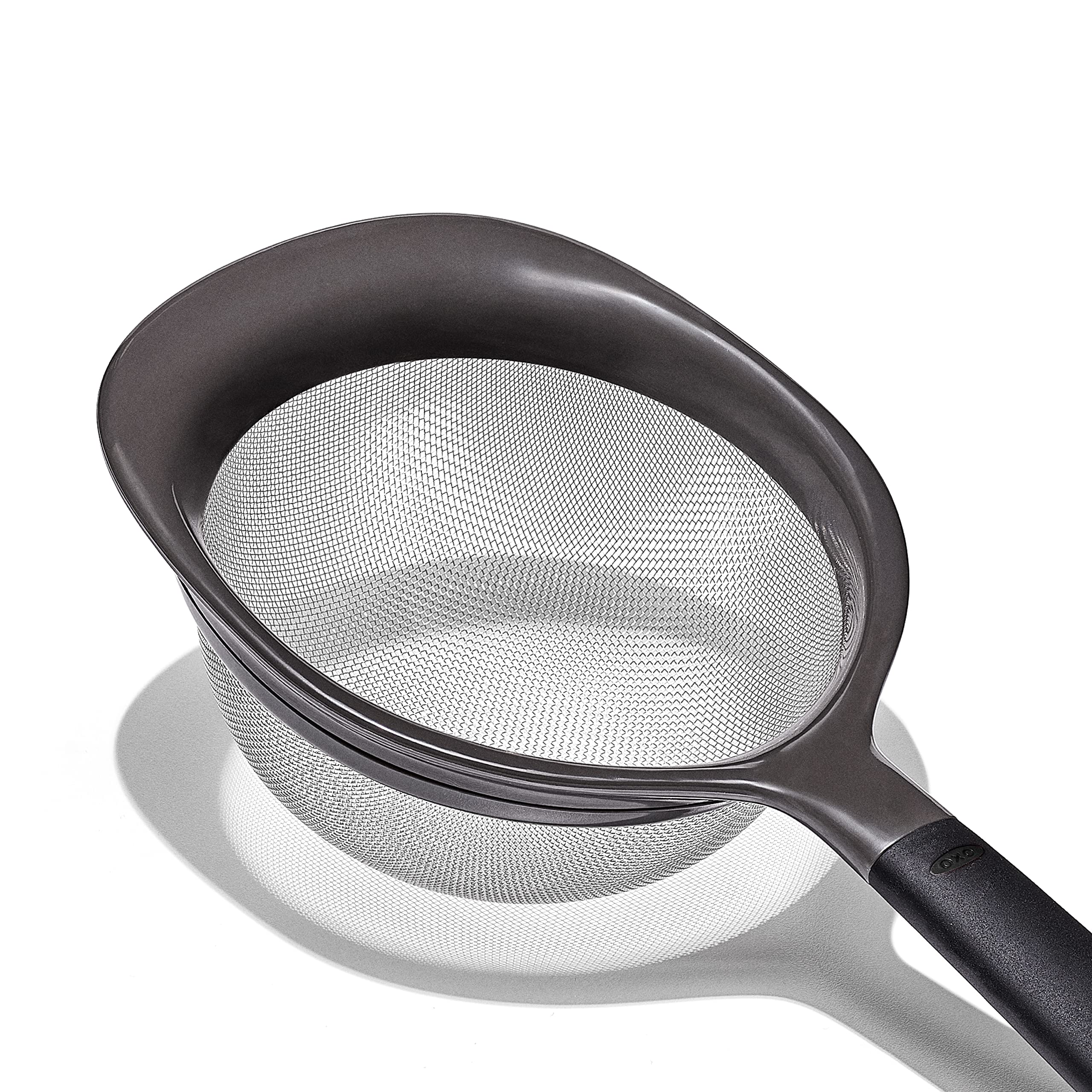 Storage holes in OXO Good Grips strainer handles for hanging.