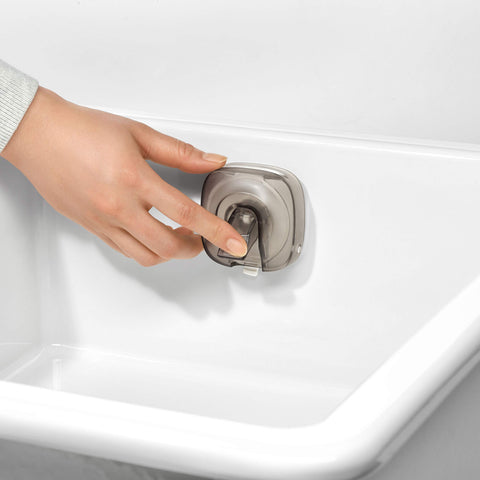 OXO Good Grips StrongHold installed in a stainless steel sink keeps items dry.