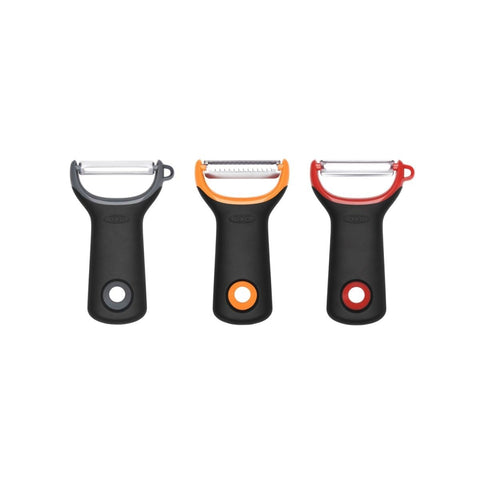 OXO Good Grips straight peeler showing sharp rustproof blade for precise peeling.