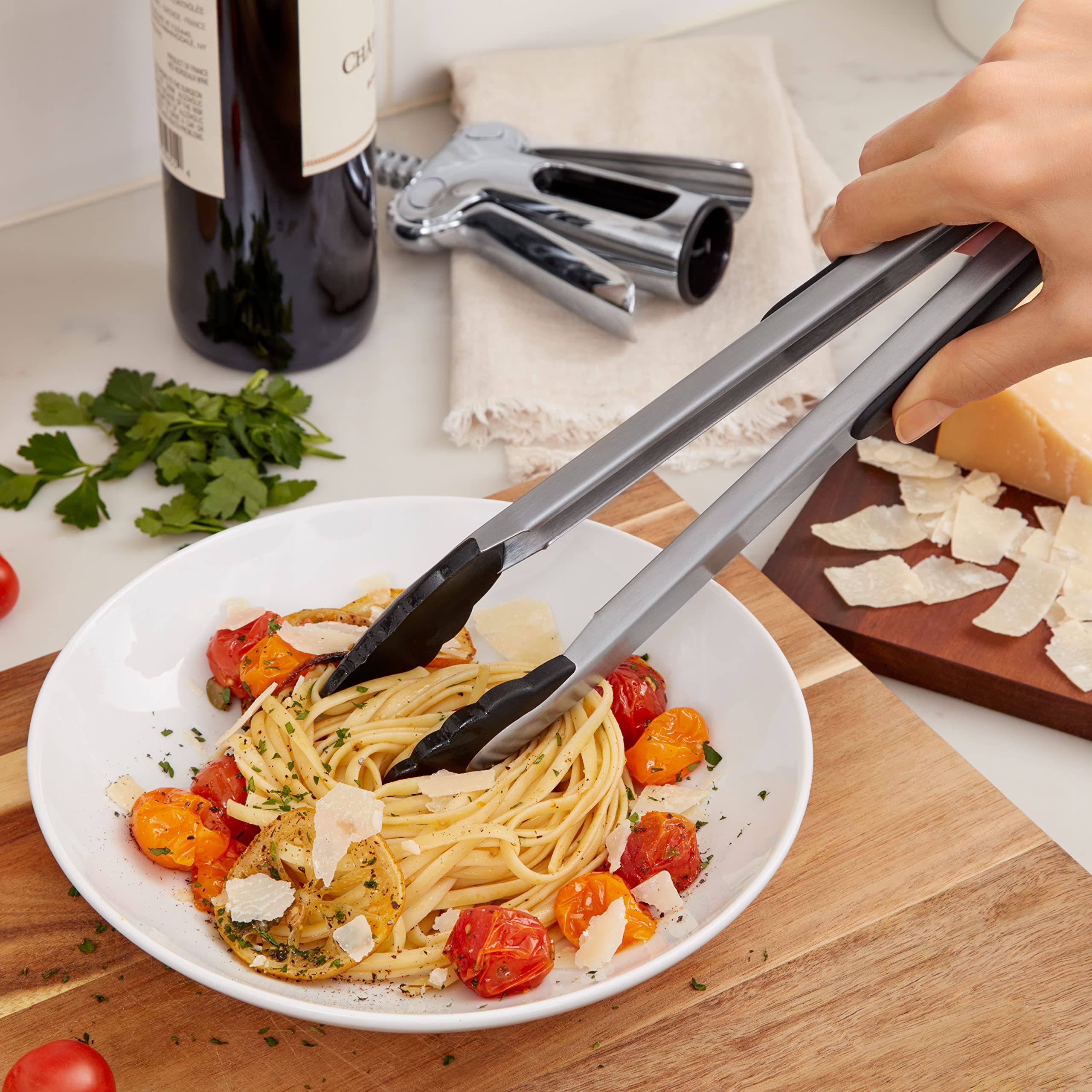 OXO Good Grips tongs with nylon heads resist heat up to 400F for grill use