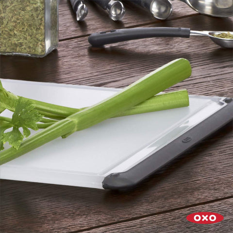OXO Good Grips Cutting Board meat-side and veggie-side layout reduces cross-contamination risk.