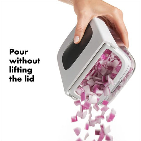 OXO Good Grips chopper showing the easy pour opening for mess-free transfer.