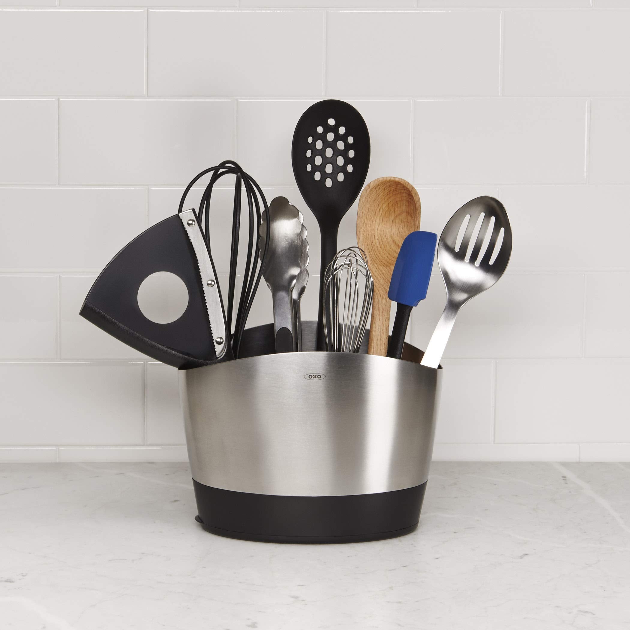OXO SteeL 9-Inch Whisk in use whisking eggs and batter