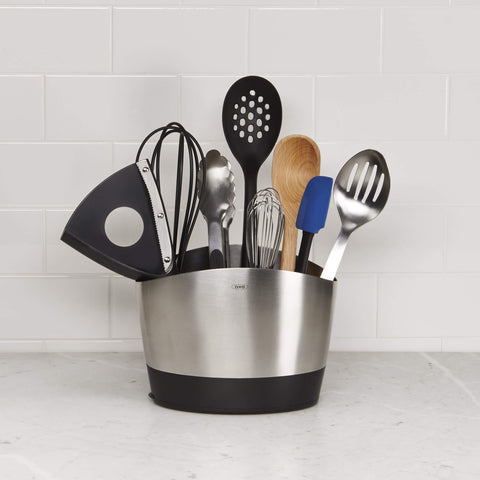 OXO SteeL 9-Inch Whisk in use whisking eggs and batter