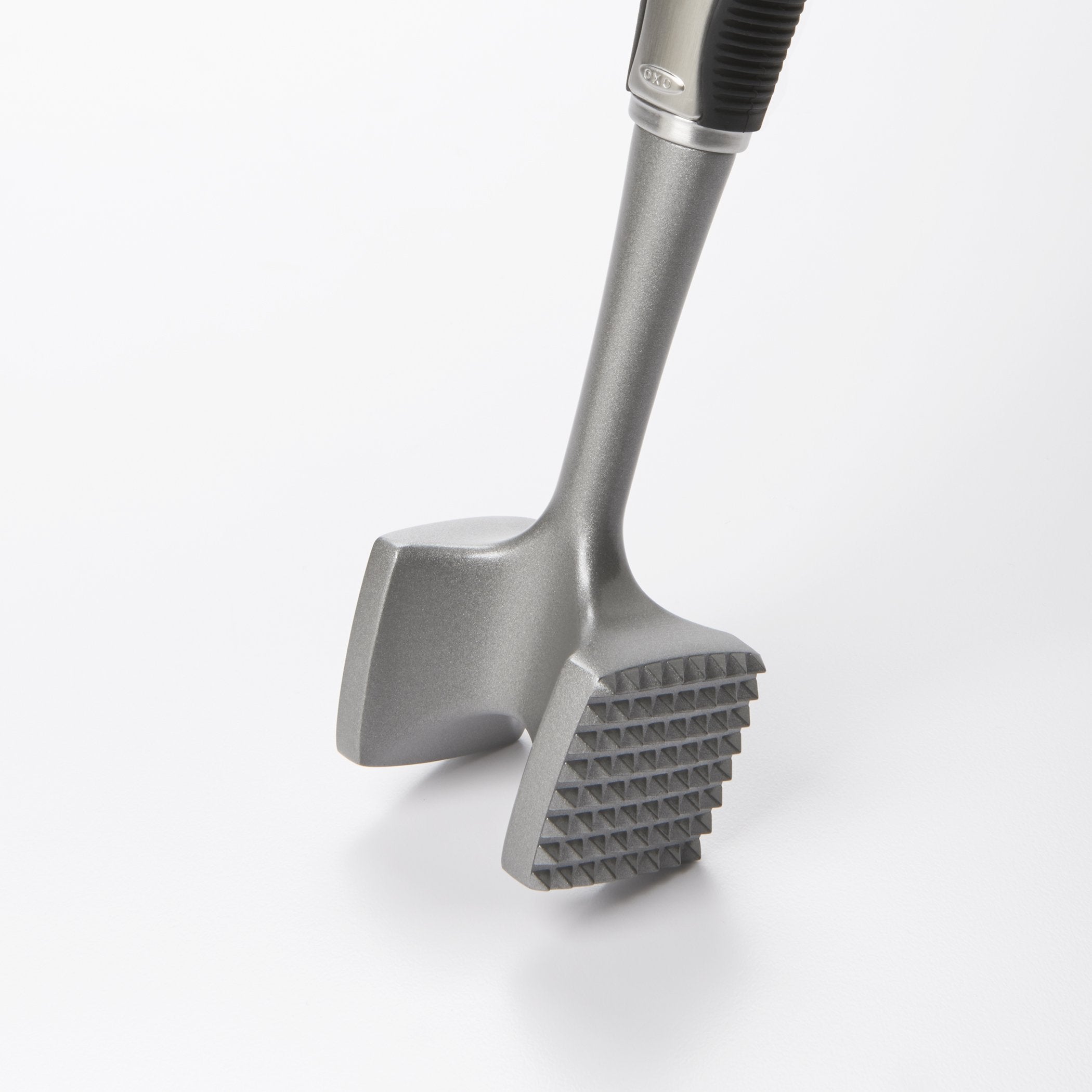 Tenderizes by pounding for even texture across cuts.