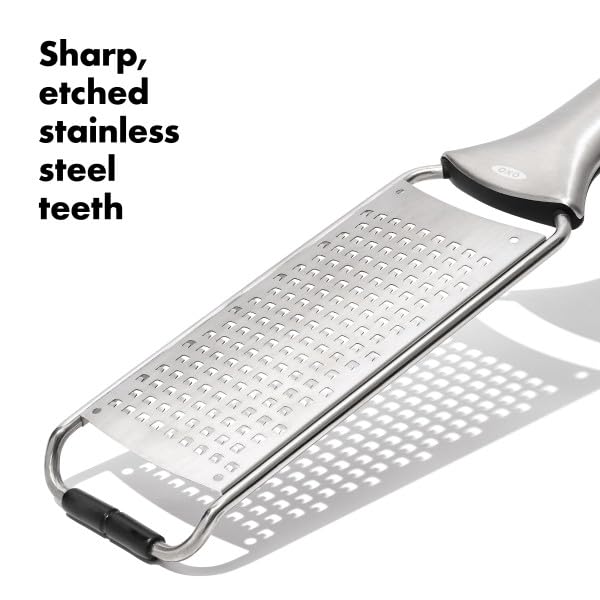 OXO Steel Grater in action grating cheese for parmesan.
