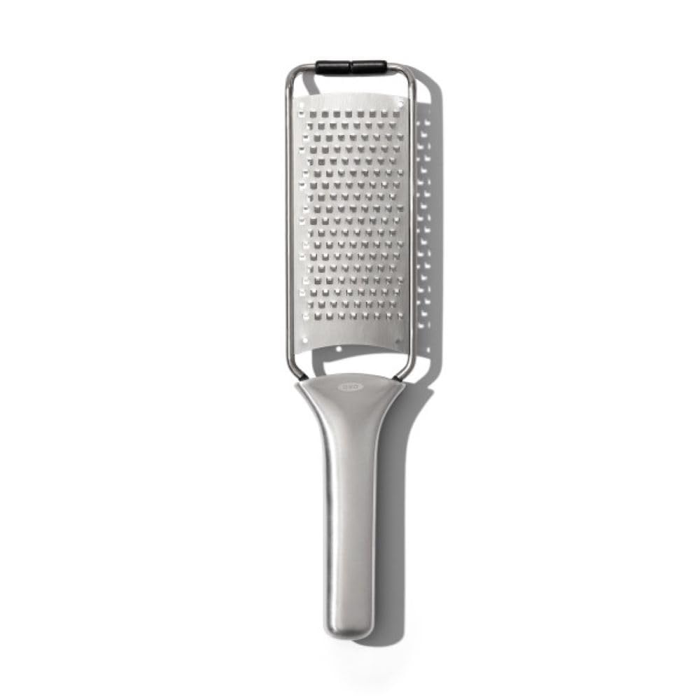 OXO Steel Grater showing sharp teeth for quick, even cheese grating.