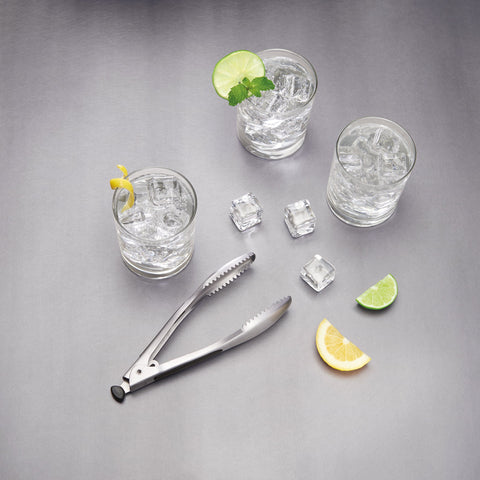 OXO SteeL ice bucket lid allows one-handed access and secure closure.