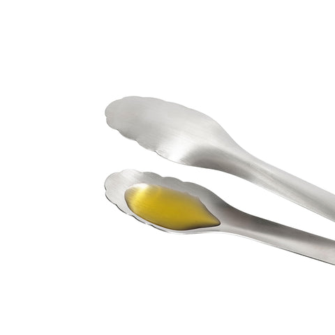 OXO Steel Serving Tongs serving salad with confident even portioning
