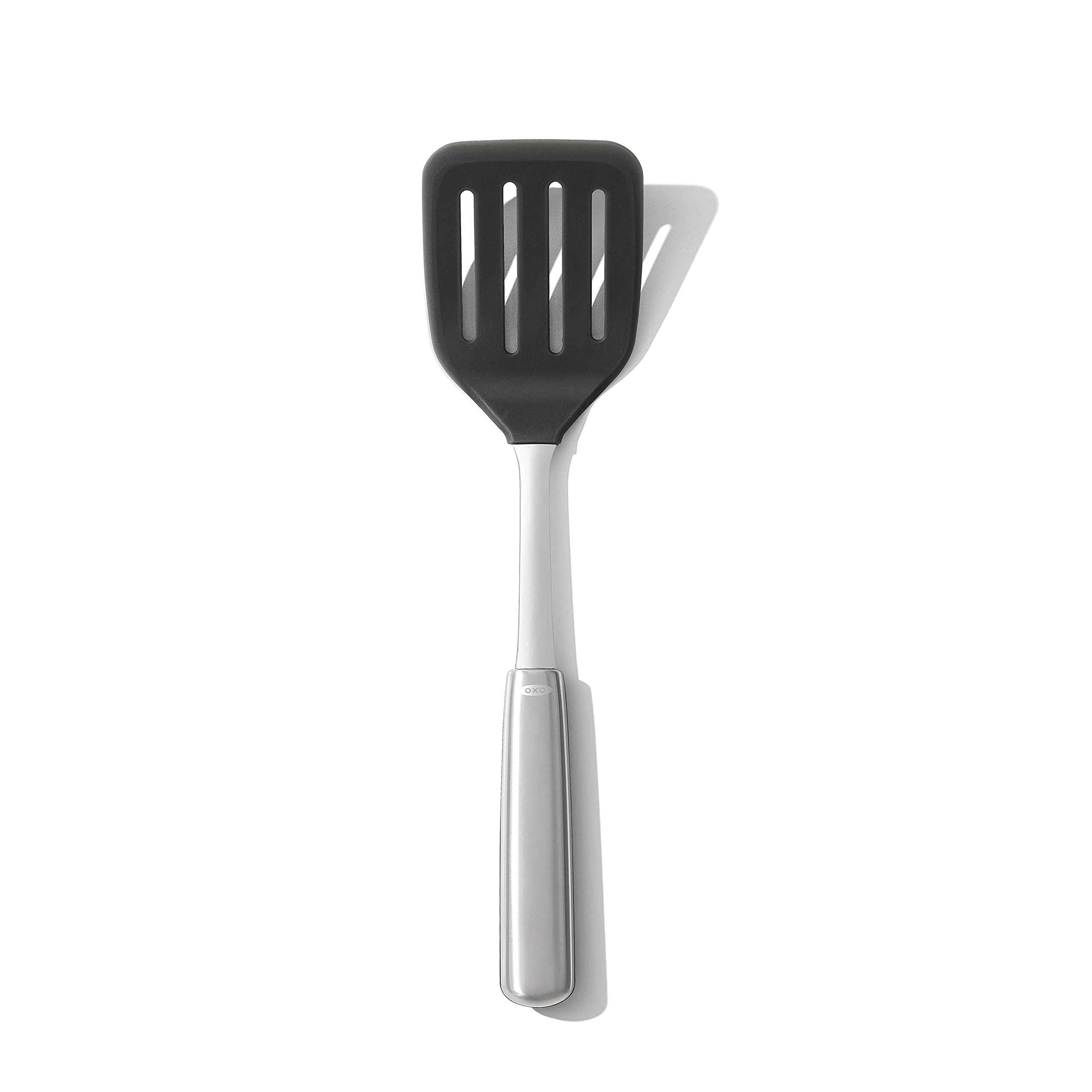 OXO Steel Silicone Flexible Turner head close-up shows heat-safe silicone for non-stick cookware