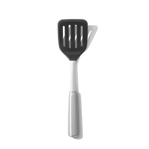OXO Steel Silicone Flexible Turner head close-up shows heat-safe silicone for non-stick cookware