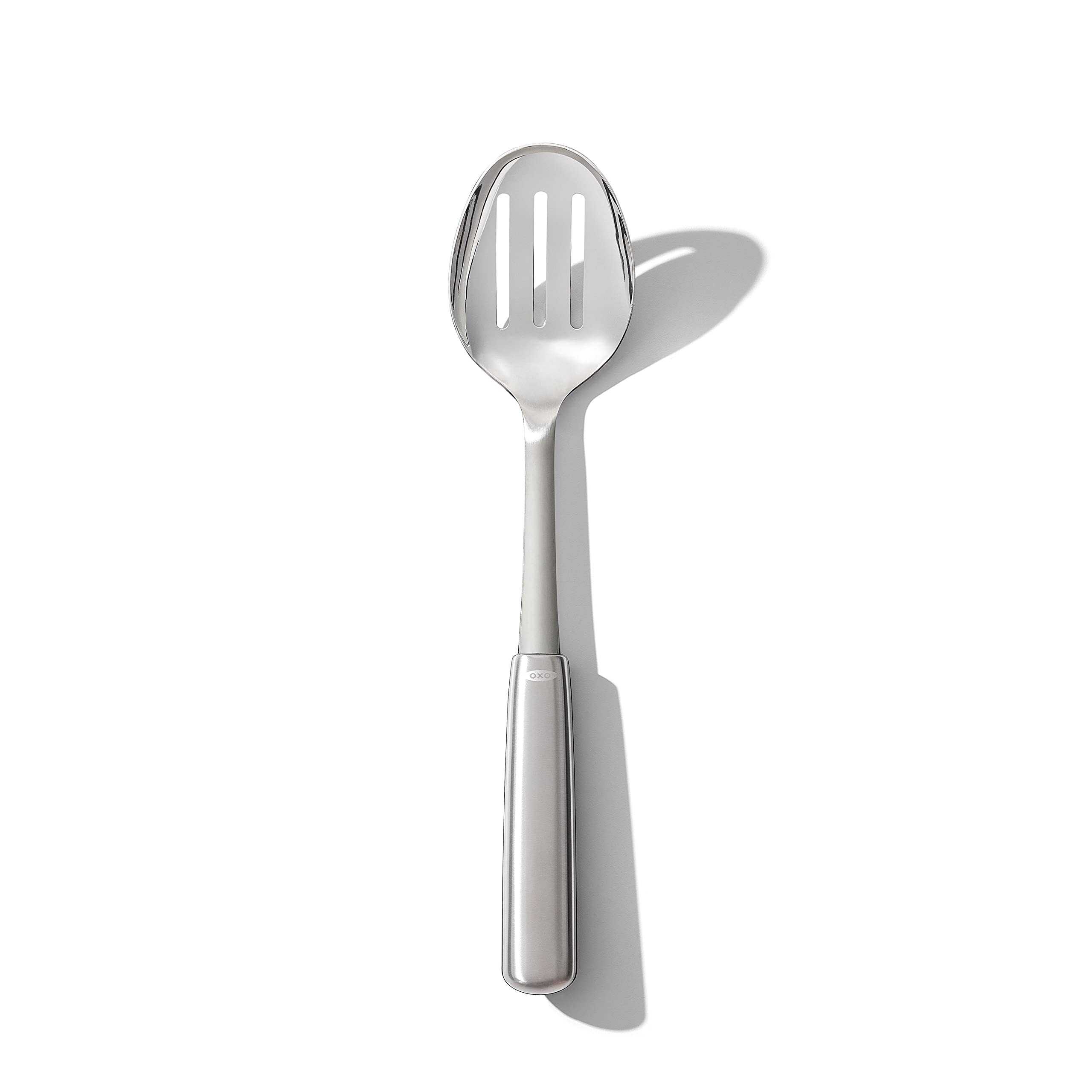 OXO Steel Slotted Spoon top view drains liquids while lifting vegetables.