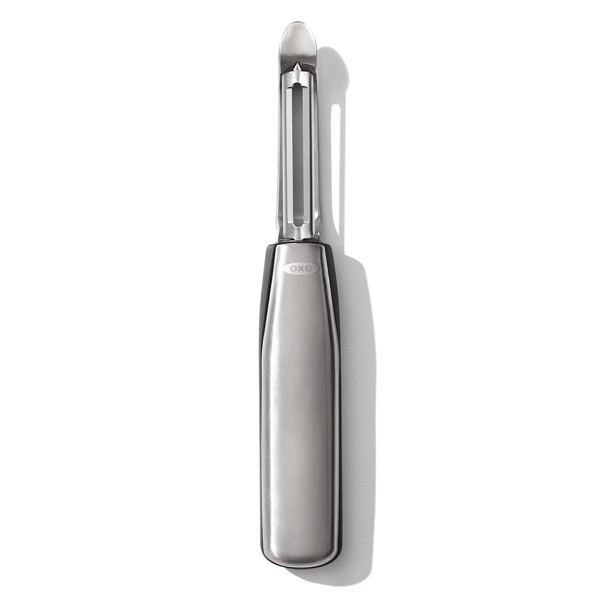OXO Steel Swivel Peeler blade close-up showing sharp edge for firm produce