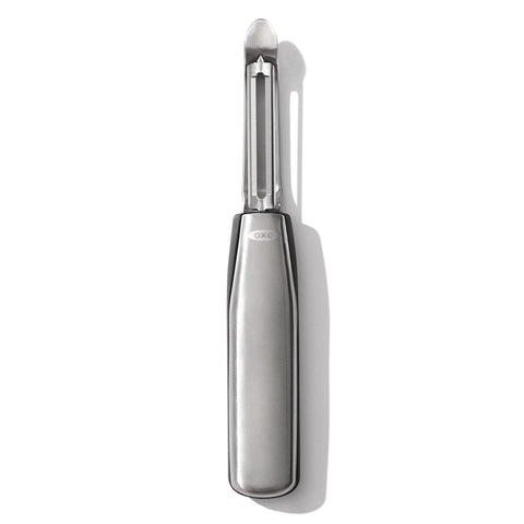 OXO Steel Swivel Peeler blade close-up showing sharp edge for firm produce