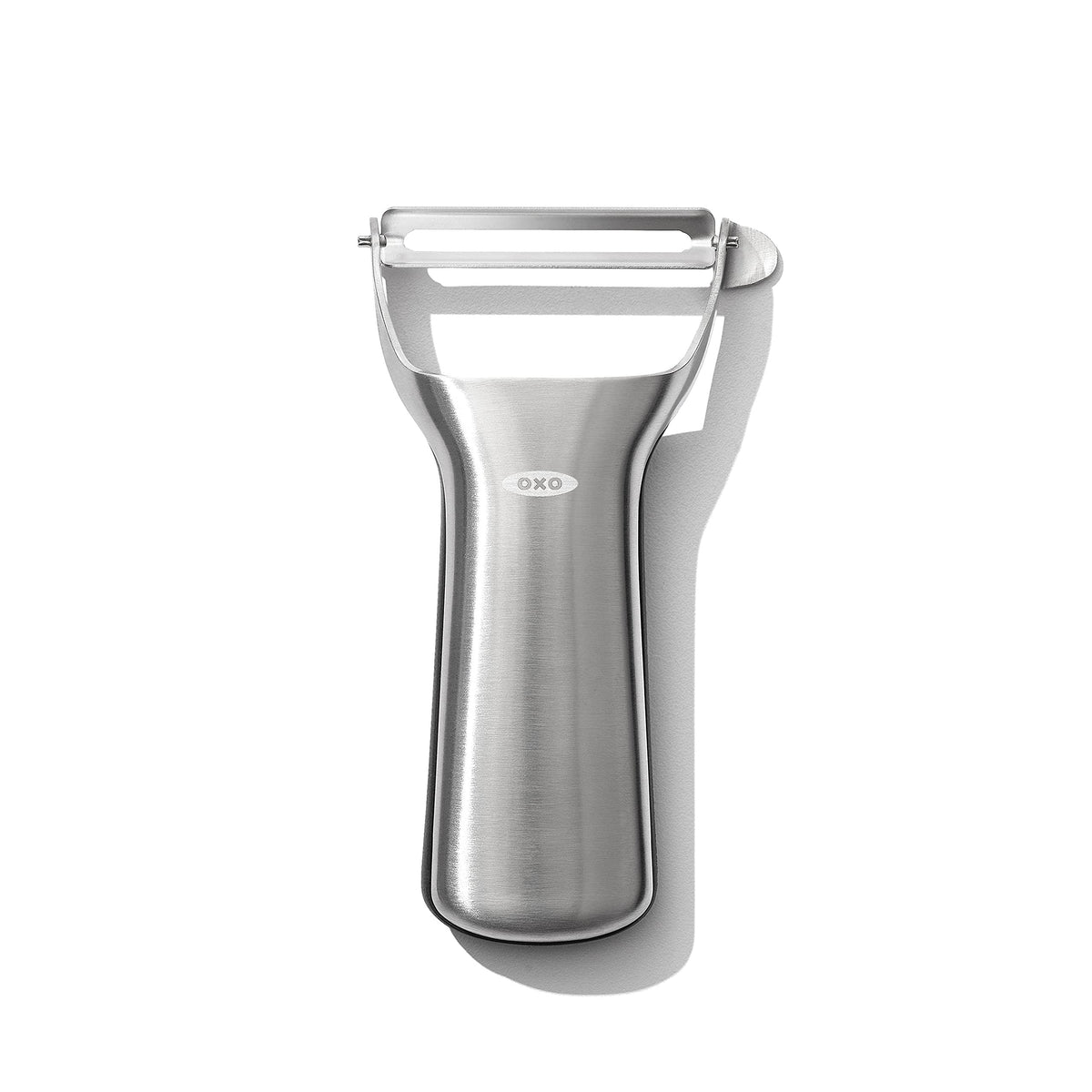 OXO Steel Y-Peeler blade gliding through firm produce for quick prep