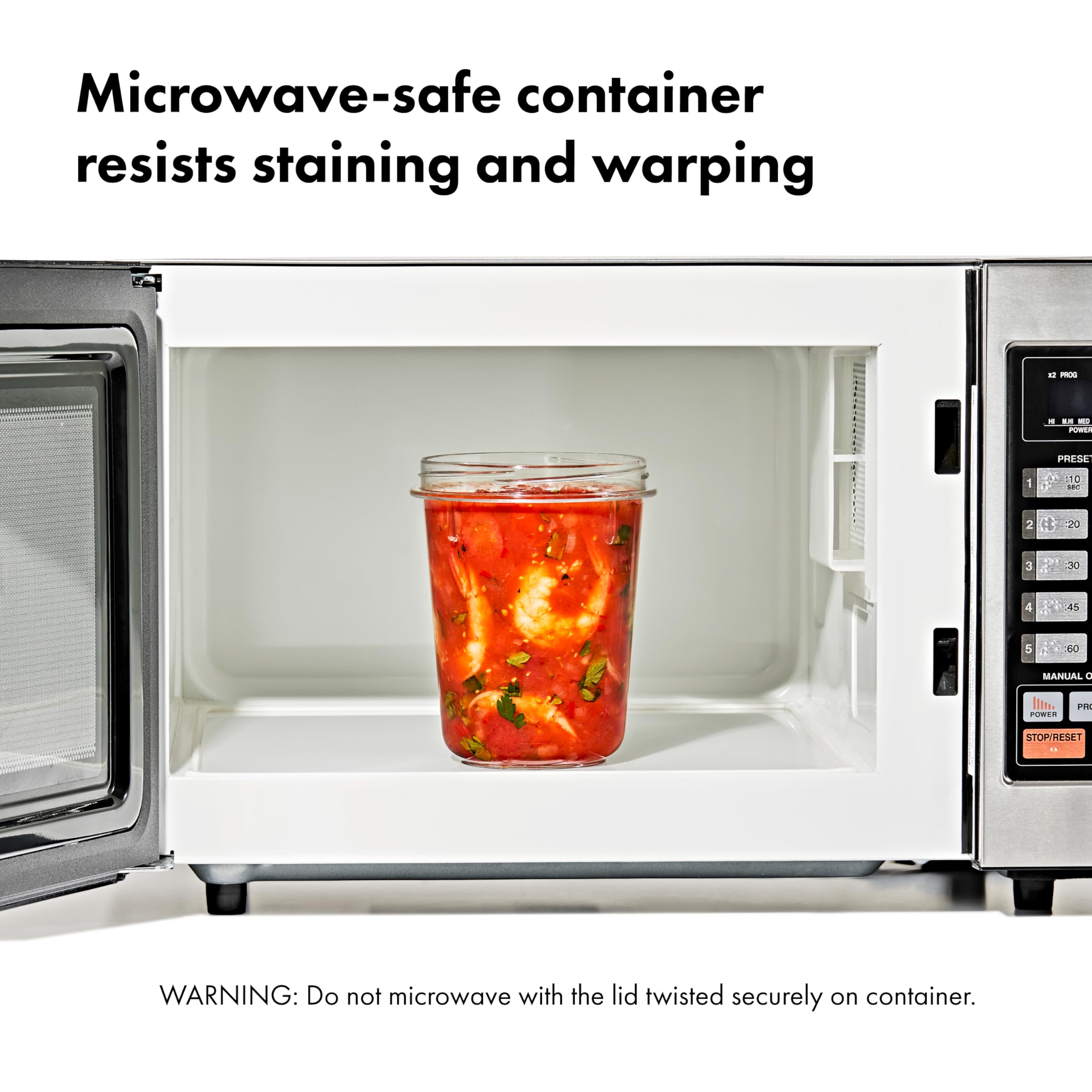 Container on a rack, ready for top-rack dishwasher cleaning