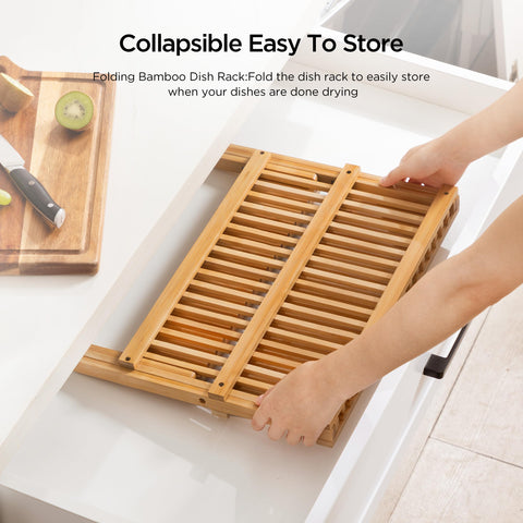 Oyydecor hanging utensil holder with vents keeps cutlery dry.