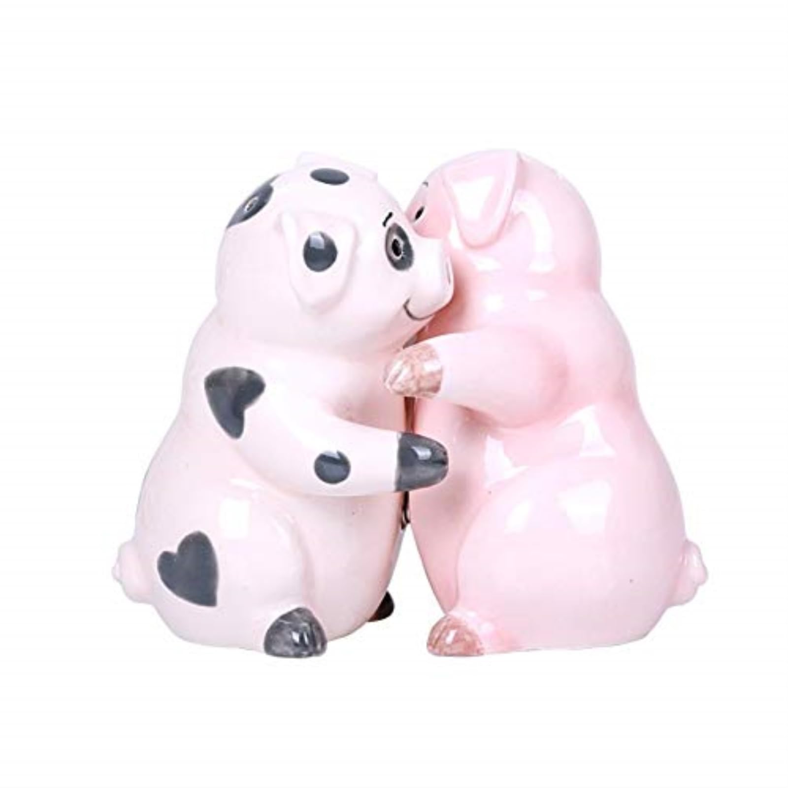 Pacific Giftware Hugging Pigs salt and pepper shakers on table, decorative and functional.