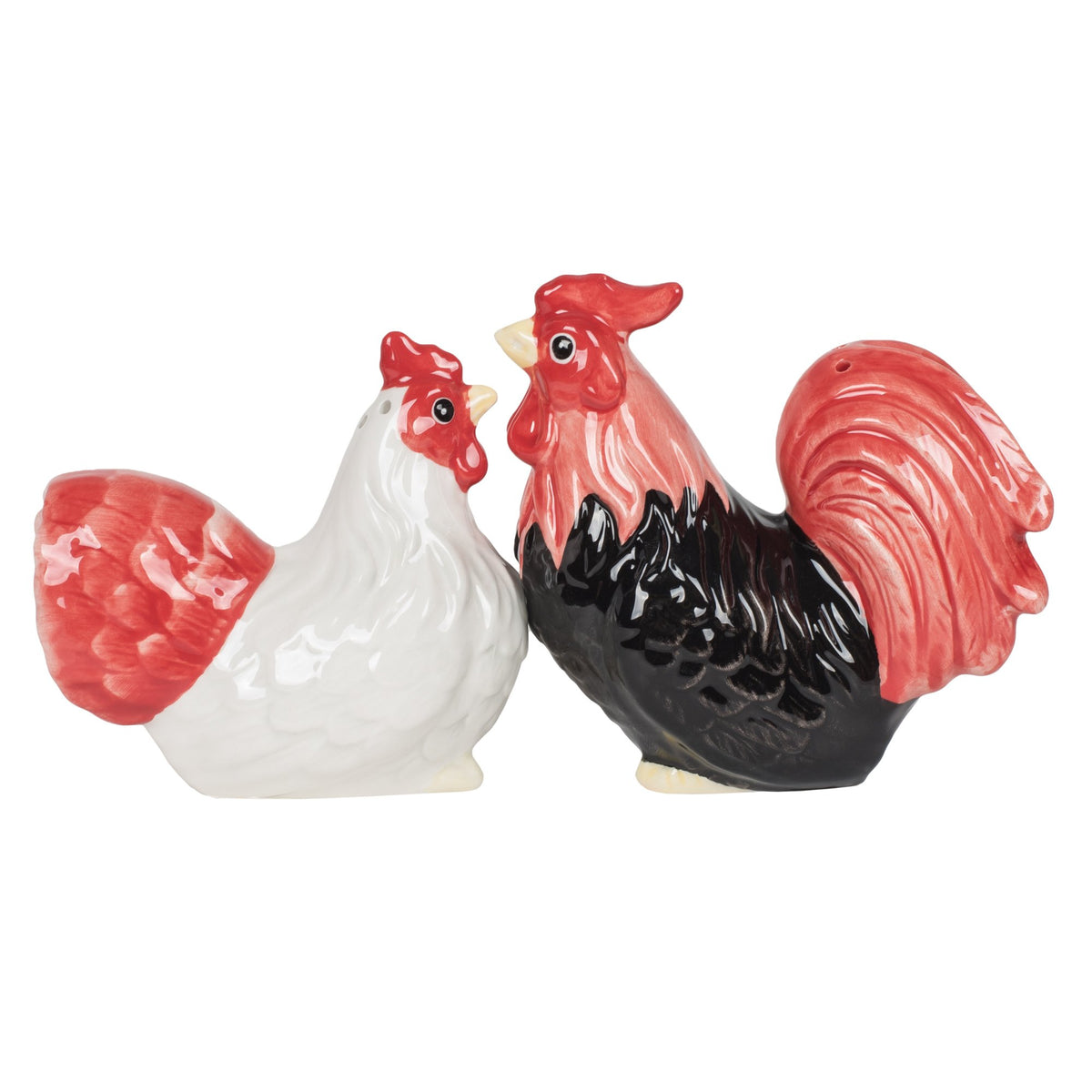 Pacific Giftware rooster and hen salt pepper set on a dining table for everyday use