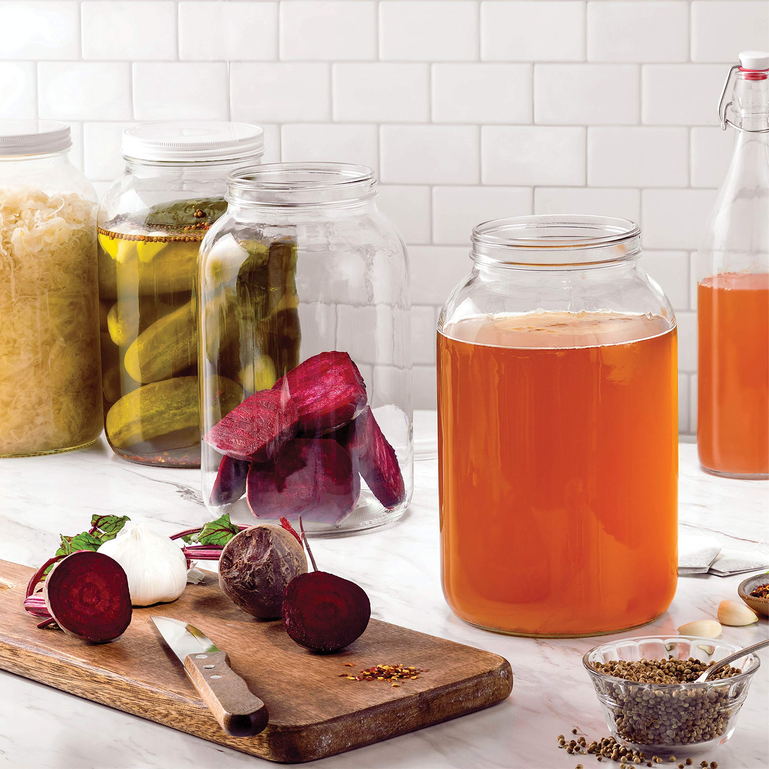 Paksh Novelty two-pack glass jars with airtight lids preserve freshness.
