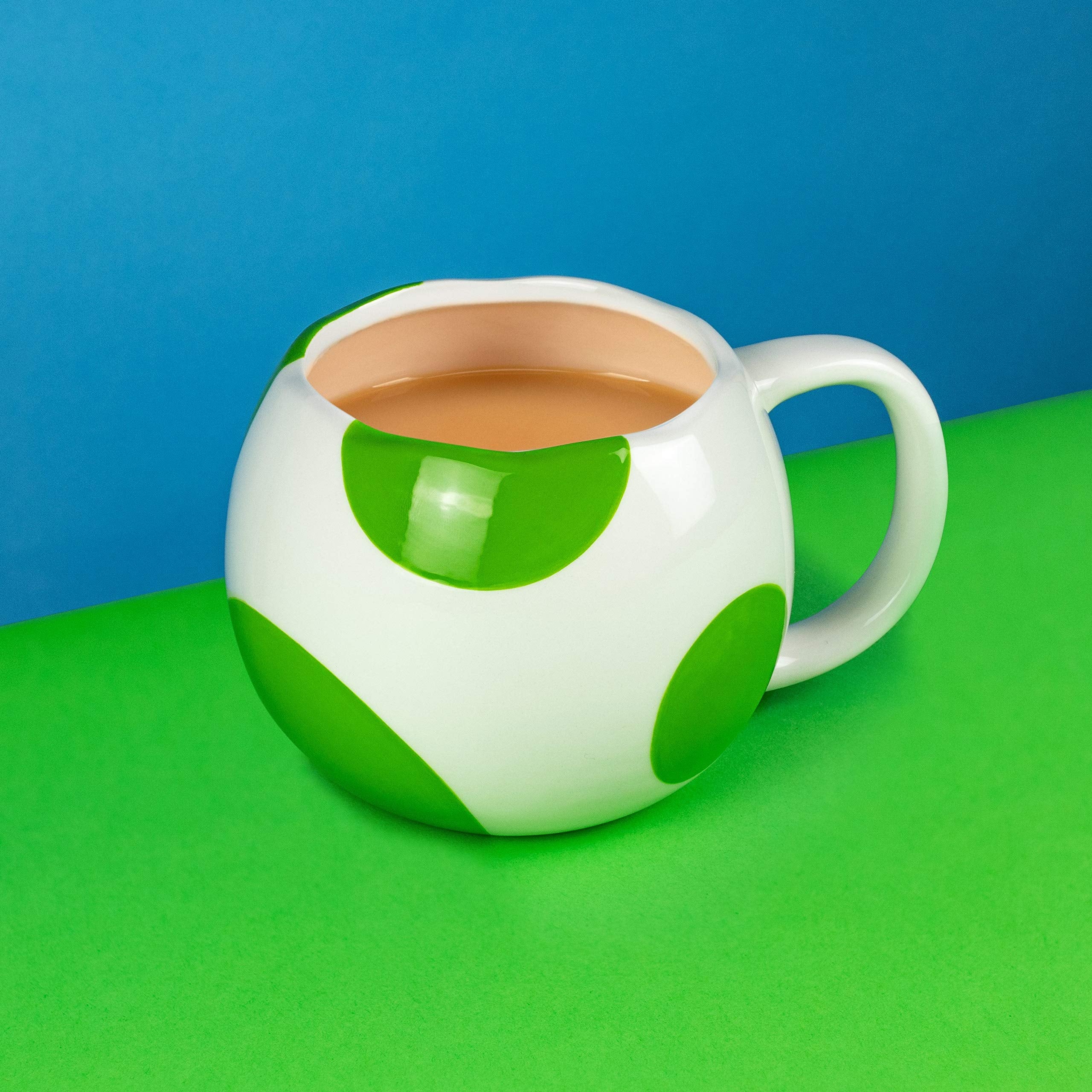 Paladone Yoshi Egg mug handle closeup, comfortable grip for daily tea or coffee.