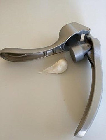 Pampered Chef garlic press 2575, ergonomic handle for comfortable, precise mincing.