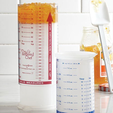 Pampered Chef Measure All Cup 2225 with adjustable plunger for clean ejection of solids