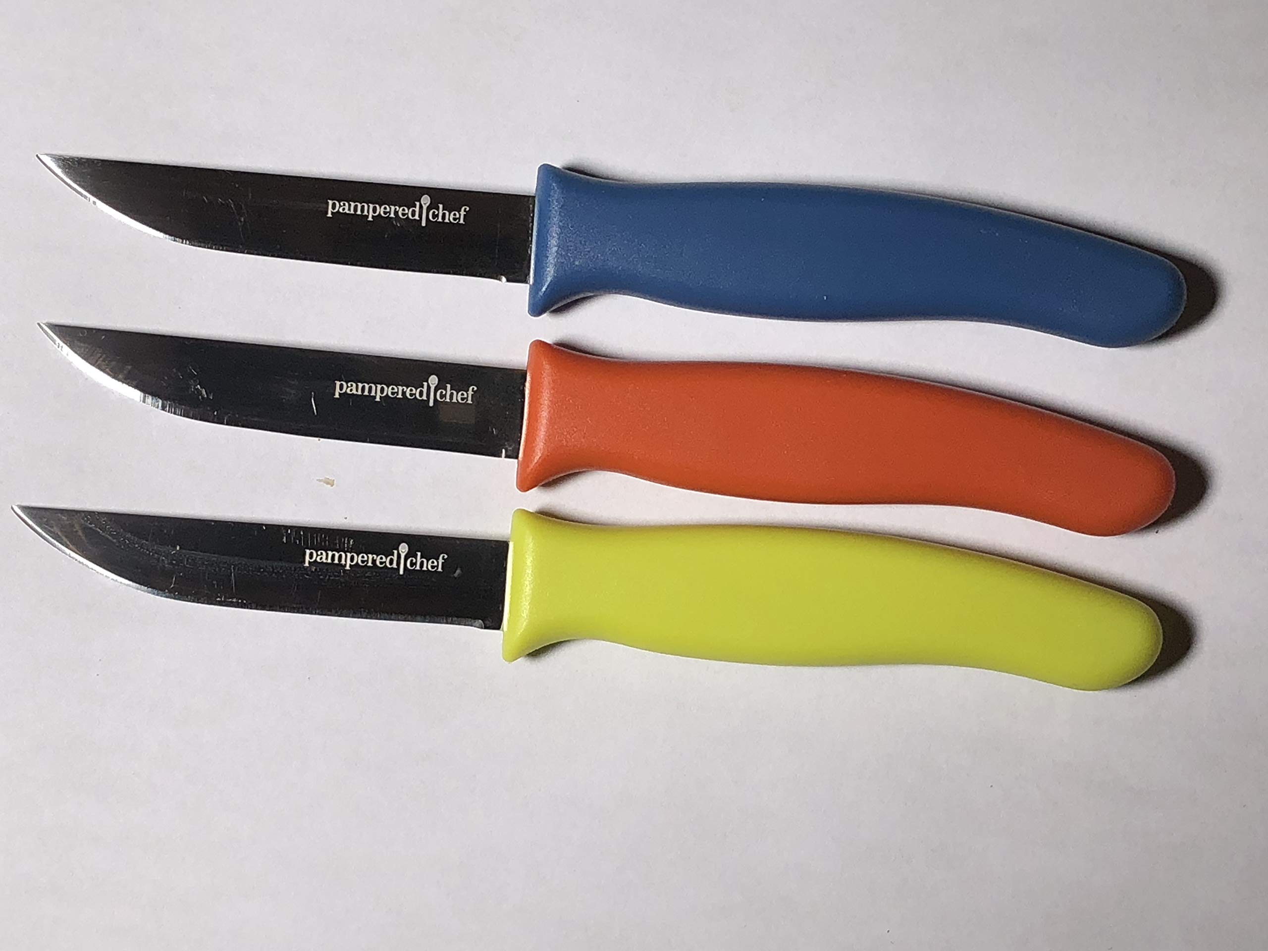 Pampered Chef paring knife set displayed for versatile kitchen prep.