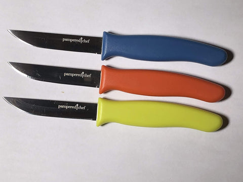 Pampered Chef paring knife set displayed for versatile kitchen prep.